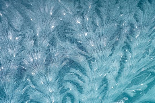 Frost tracery patterns on glass pane, Germany, Europe