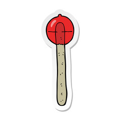 sticker of a cartoon lollipop
