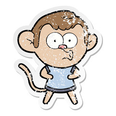 distressed sticker of a cartoon surprised monkey