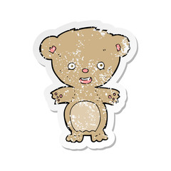 retro distressed sticker of a cartoon teddy bear