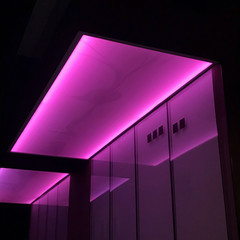 Pink neon lights in a room