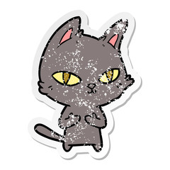 distressed sticker of a cartoon cat staring