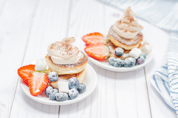 Obraz na płótnie Canvas Healthy breakfast, homemade pancakes with fresh berries