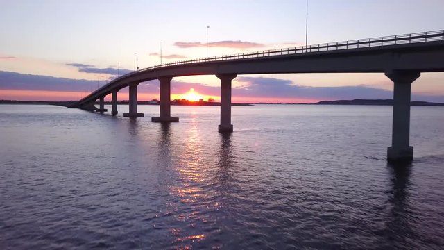 Drone footage of bridge sunset 4K flying towards bridge,