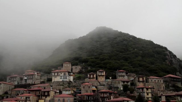 Fog covering the beautiful Stemnitsa village in Greece