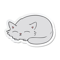 sticker of a cartoon cat sleeping
