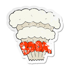 retro distressed sticker of a cartoon explosion