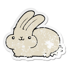 distressed sticker of a cartoon rabbit