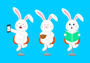 Obraz na płótnie Canvas Cute cartoon rabbit sitting cross-legged. Selfie, drinking coffee and reading book. Vector illustration isolated on blue backgroung.