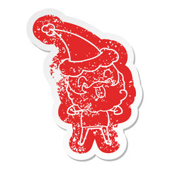 man with beard sticking out tongue wearing santa hat