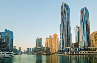 Dubai marina towers, boats and skyscrapers