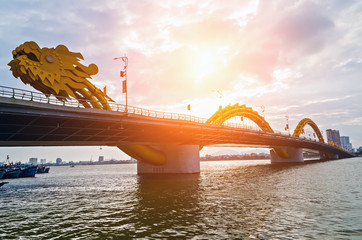 Dragon Bridge in Da Nang Han river in Vietnam. - obrazy, fototapety, plakaty