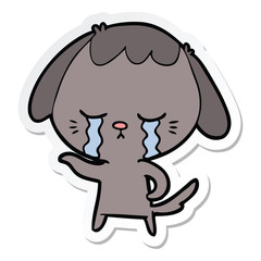 sticker of a cartoon dog crying