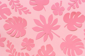 Fototapeta na wymiar Tropical leaves pattern. Trendy pink tropical leaves of paper on pink background. Flat lay, top-down composition, creative paper art