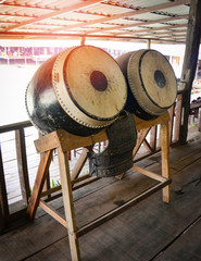 Chinese large drum on wood shelves made from buffalo skin