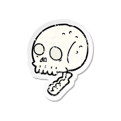distressed sticker of a cartoon spooky skull