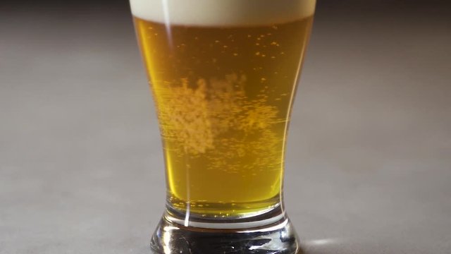 IPA style beer in pint glass from bottom to top.