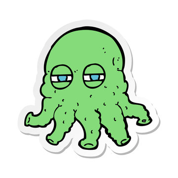 sticker of a cartoon alien face