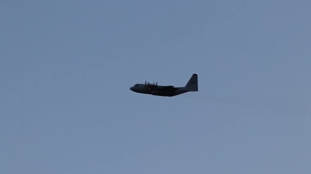 C-130 fire bomber silhouette.