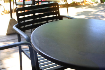 black table metal of outdoor garden in the morning