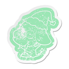 happy cartoon distressed sticker of a elephant wearing santa hat