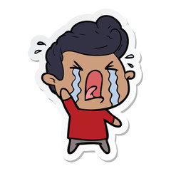 sticker of a cartoon crying man
