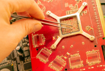 Repair and adjustment of computer chips. Easy blur photo background.