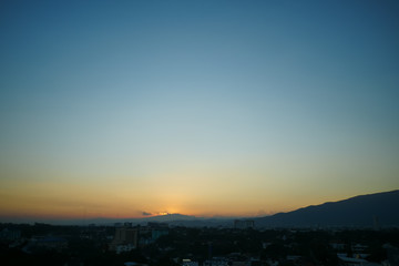 dramatic sunset sky in the city skyline