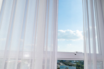 Fototapeta na wymiar white curtain on glass window