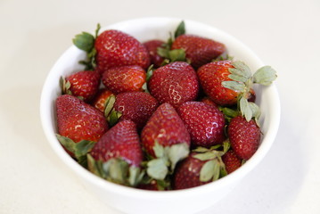delicious strawberrys seasonal red fruits freshly cut on granite table