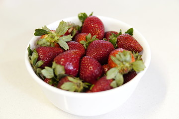 delicious strawberrys seasonal red fruits freshly cut on granite table