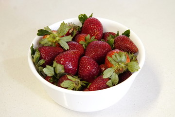 delicious strawberrys seasonal red fruits freshly cut on granite table