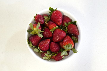 delicious strawberrys seasonal red fruits freshly cut on granite table