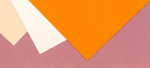 Color papers geometry composition background with beige orange and brown color tones