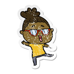 distressed sticker of a cartoon happy woman wearing spectacles