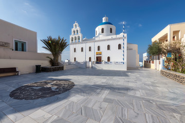 Santorini church. White and blue orthodox church of Panagia Platsani, in the village of Oia....