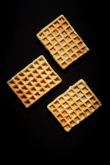 Waffles on a black background