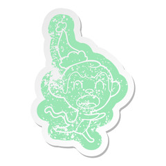 shouting cartoon distressed sticker of a monkey wearing santa hat