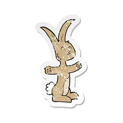 retro distressed sticker of a cartoon rabbit
