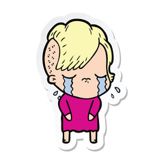 sticker of a cartoon crying girl