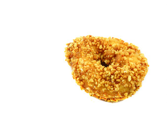 Close up of donuts sprinkled with crushed nuts tasty