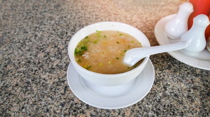 Mush morning breakfast bowl on table made from rice to boil