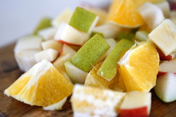 orange pear and apple prepared for a fresh and nutritious salad