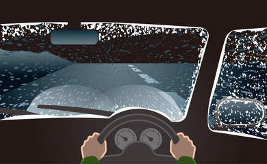 吹雪の天候でヘッドライトをロービームにして運転　 © hiro