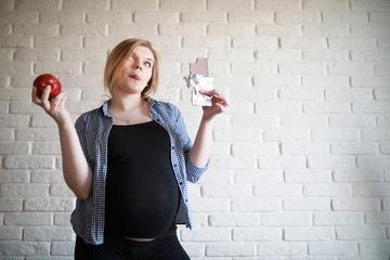 Pregnant young beautiful girl on the ninth month