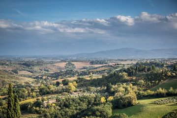 Fototapeta na wymiar Beautiful autumn landscape in Tuscany. Near Siena, Tuscany, Italy