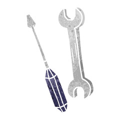 retro cartoon doodle of a spanner and a screwdriver