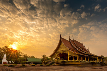 Fototapeta na wymiar Thai temples at Sun rise, Phu Phrao Temple (Wat Sirindhornwararam), Ubon Ratchathani Province, Thailand