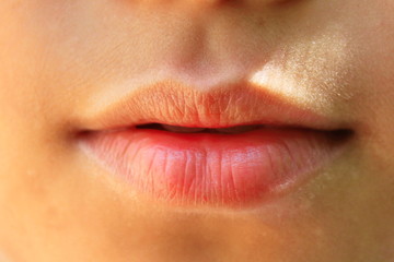 Close-up image of the real person's mouth.