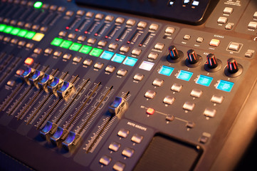 Audio mixer in a recording studio